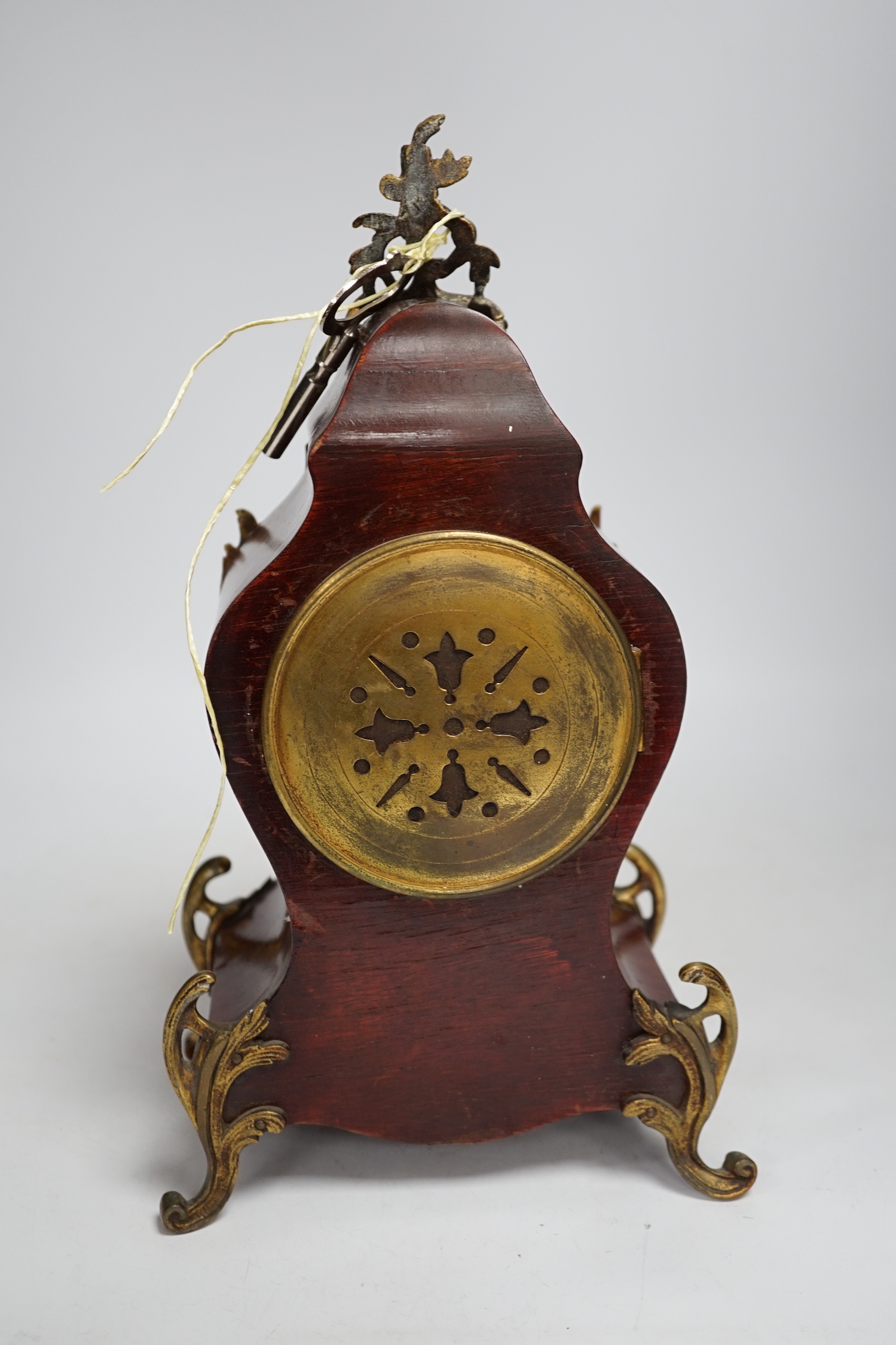 A 19th century French red boulle mantel clock, 31.5cm